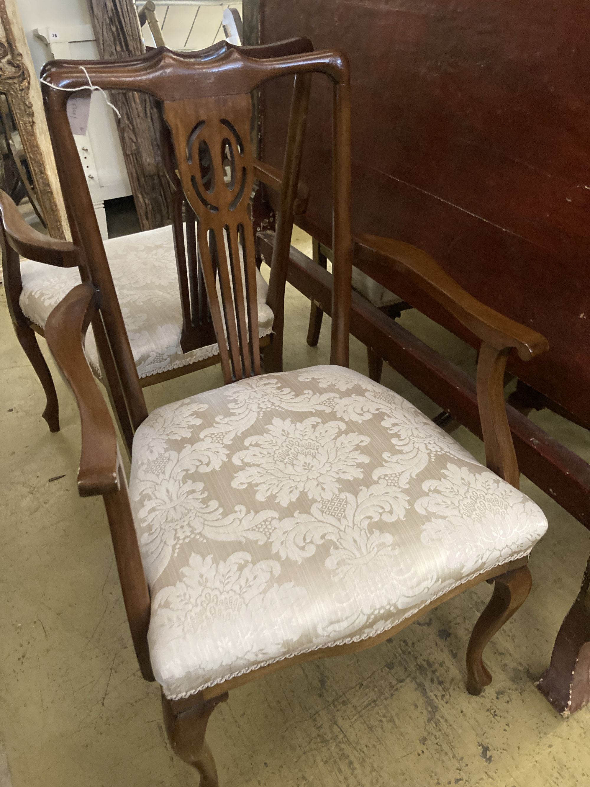A set of eight Edwardian mahogany dining chairs (two with arms)